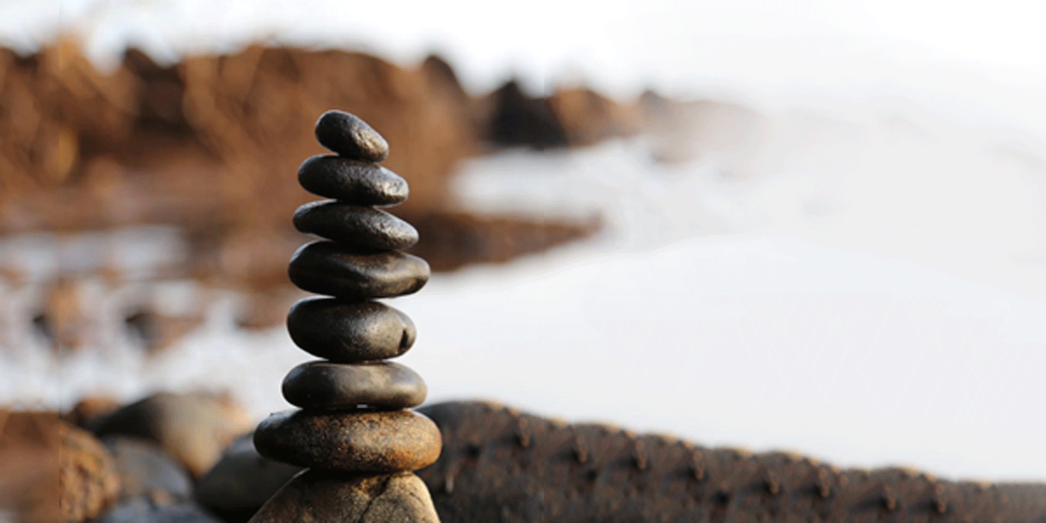 Stacked stones near the ocean
